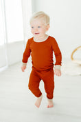 Load image into Gallery viewer, Rust Ribbed Two-Piece Set – Ultra-Soft Bamboo Outfit for Kids with Long Sleeve Top and Matching Pants
