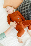 Load image into Gallery viewer, Rust Ribbed Two-Piece Set – Ultra-Soft Bamboo Outfit for Kids with Long Sleeve Top and Matching Pants
